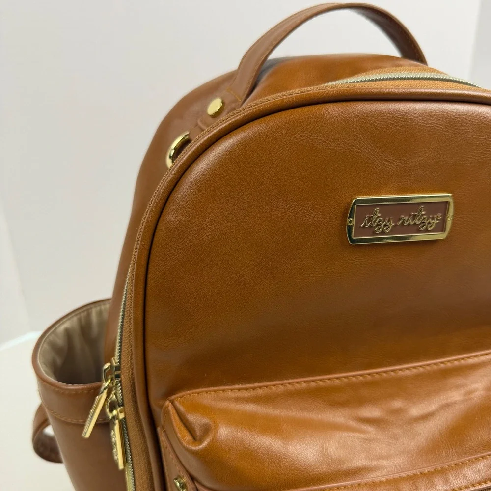 Itzy Ritzy Boss Backpack Diaper Bag Cognac Brown Vegan Leather Gold Hardware